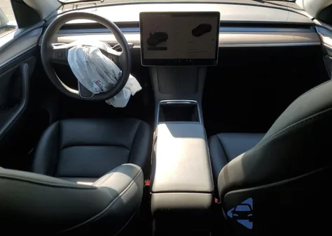 2025 Tesla Model Y from USA, damaged, VIN 7SAYGDEE5SF288468